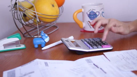 Calculating Bills On The Kitchen Table stock footage Vídeo Stock 50602929