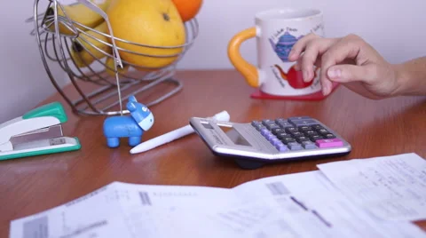 Calculating Bills On The Kitchen Table, Unsatisfactory Results stock footage Vídeo Stock 50602991