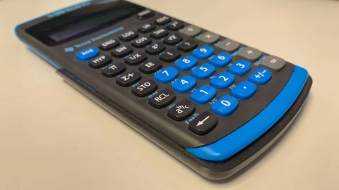 Calculating with the calculator white background 2 Stock Footage 108151017