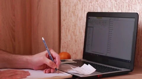 Calculating family budget at the computer 스톡 동영상 84253366