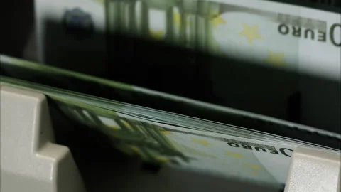 Calculating machine for money counting one hundred euro banknotes close-up Stock Footage 158168621