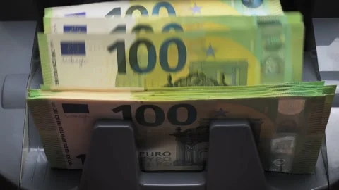 Calculating machine for money counting one hundred euro banknotes Stock Footage 233489704