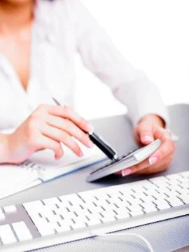 Calculating with pen Stock Photos
