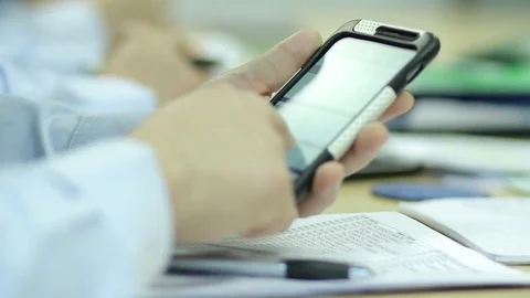Calculating on phone Stock Footage 77051972