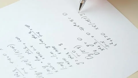Calculation of mathematical formulas. A close-up hand writes an algebraic formul Stock Footage 141841585