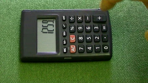 Calculation using a calculator - timelaps Stock Footage 91653670