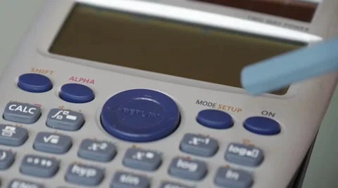 Calculations Using Calculator And Pencil Stock Footage 69021726