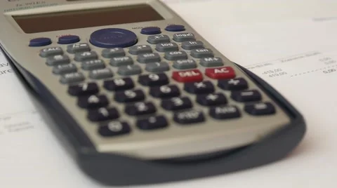 Calculations Using Calculator And Pencil Stock Footage 69021768