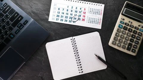 Calculator and computer, notebook and calendar free space Stock Photos