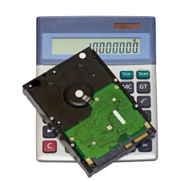 Calculator and hard disk Stock Photos