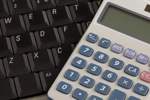 Calculator and laptop Stock Photos