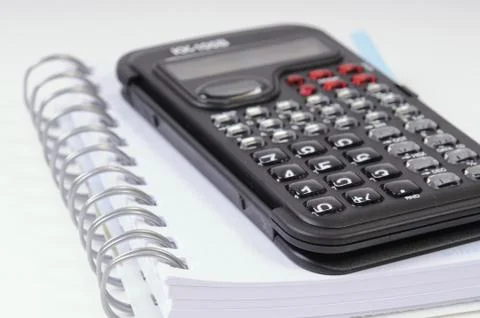 Calculator and notebook Stock Photos