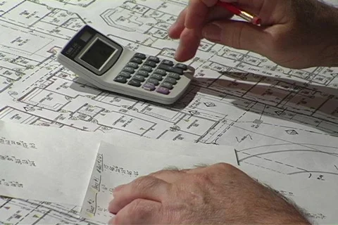 Calculator and Pencil Over Schematic Drawings Stock Footage 360511