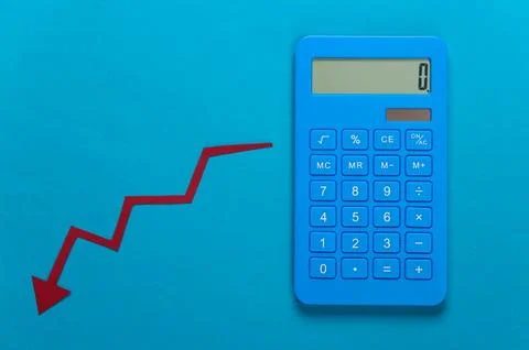 Calculator and red Fall arrow. Fall graph going down. Economic recession, cri Stock Photos
