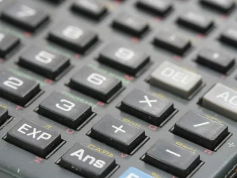 Calculator background Stock Photos
