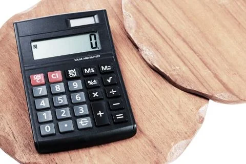 Calculator on background two wood texture Stock Photos