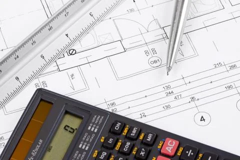 Calculator on a blueprint Stock Photos
