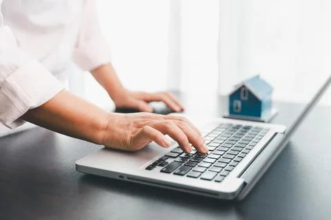 Calculator to check and summary expense of home loan mortgage for refinance.. Stock Photos