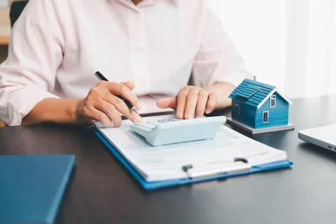 Calculator to check and summary expense of home loan mortgage for refinance.. Stock Photos