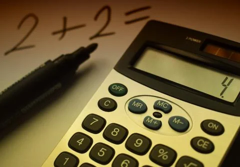 A calculator on the desktop Foto stock