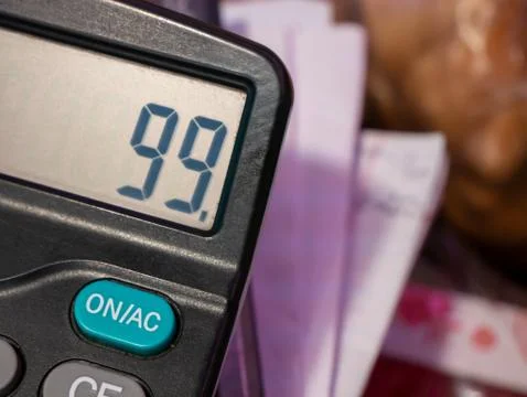 Calculator display number closeup button on ac Stock Photos