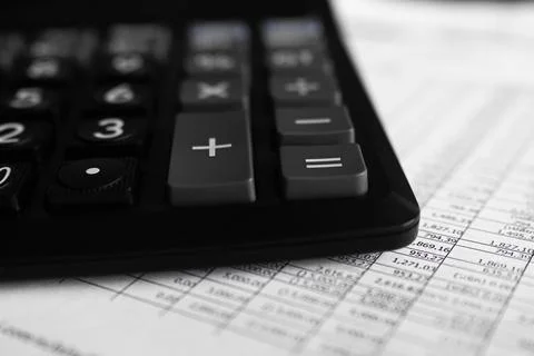 Calculator on document data information work pay tex, salary and product Foto stock