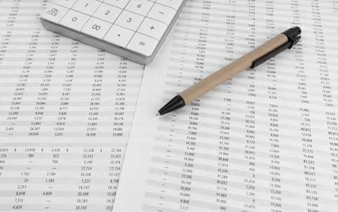 Calculator on financial statement. 스톡 사진