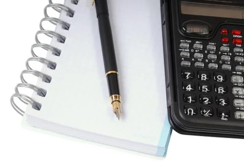 Calculator, pen and notebook Foto stock