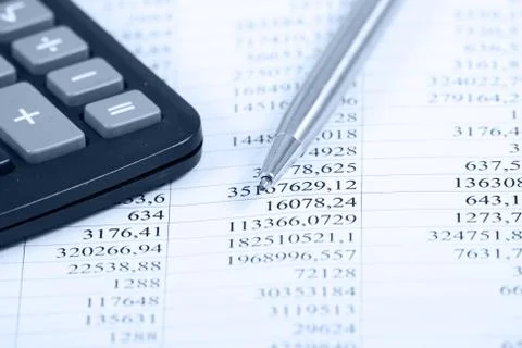 Calculator with pen Stock Photos