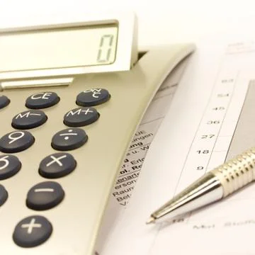 Calculator with pen Foto stock