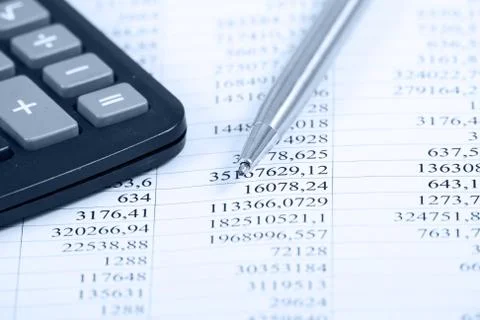 Calculator with pen Stock Photos