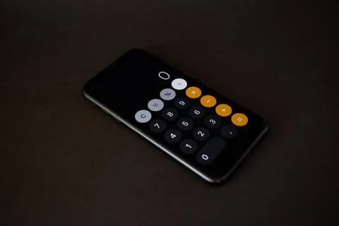 Calculator on the phone for calculation Stock Photos