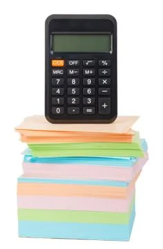 Calculator on stack of stickers Foto stock