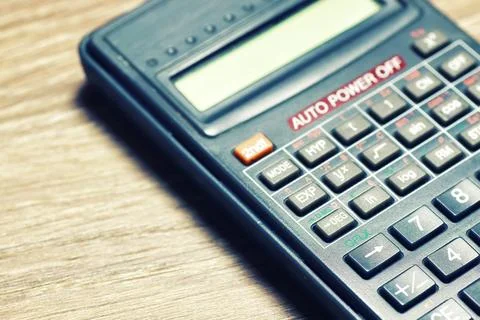 Calculator table glasses Stock Photos
