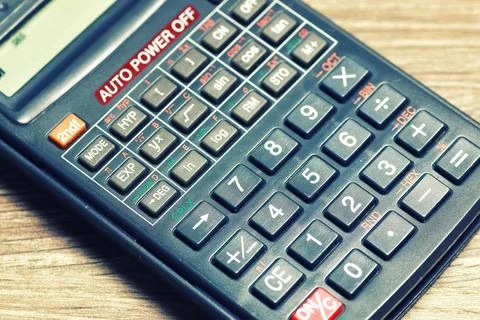 Calculator table glasses Stock Photos