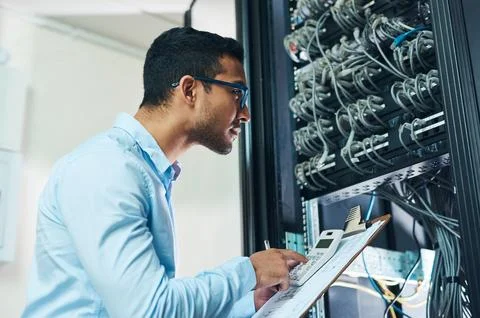 Calculator, technician and data with man in server room for cable length Stock Photos