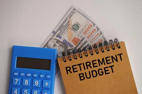 Calculator, US Dollar and notebook printed retirement budget, financial concept Foto stock