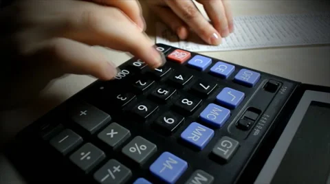 Calculator. Women's hands. Check. Work on the calculator Stock Footage 46443174