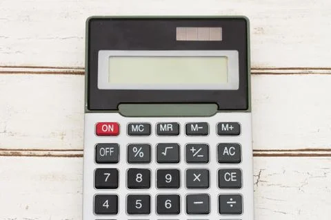 Calculator on wood background Foto stock