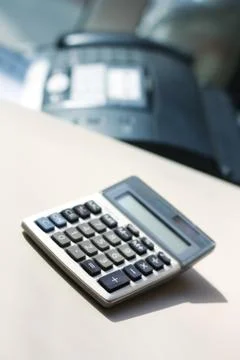 Calculator on working place Stock Photos