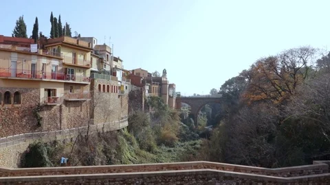 Caldes de Montbui slow pan of romanesque bridges. Stock Footage 123533062