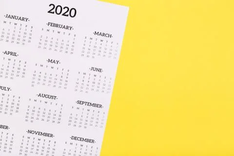 Calendar 2020  on solid yellow background with copy space, business meeting s Foto stock