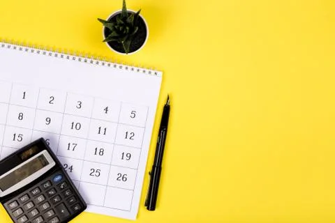 Calendar 2020  on solid yellow background with copy space, business meeting s Stock Photos