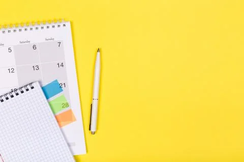 Calendar 2020  on solid yellow background with copy space, business meeting s Stock Photos