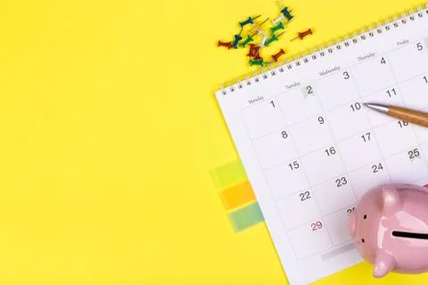 Calendar 2020  on solid yellow background with copy space, business meeting s Stock Photos