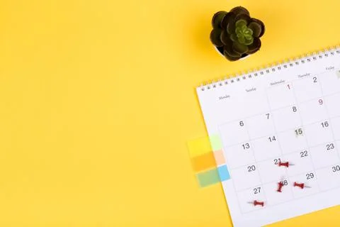 Calendar 2020  on solid yellow background with copy space, business meeting s Stock Photos