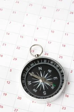 Calendar and compass Stock Photos