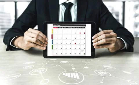 Calendar on computer software application for modish schedule planning Stock Photos