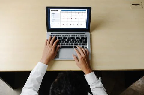 Calendar on computer software application for modish schedule planning Stock Photos
