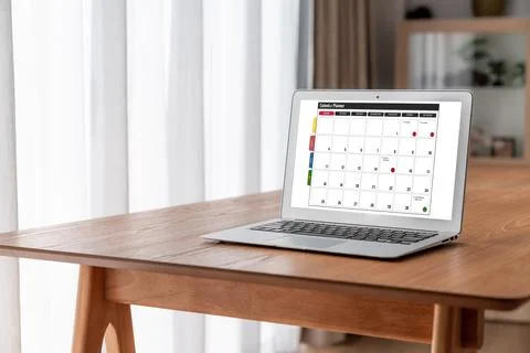 Calendar on computer software application for modish schedule planning Stock Photos